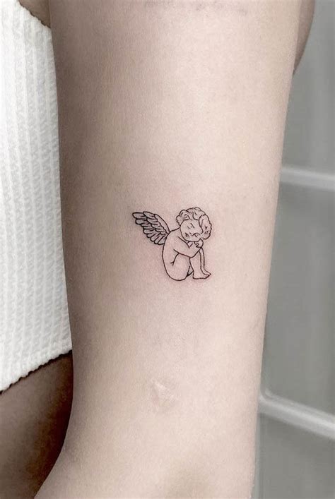 angel tattoo|small angel tattoos for females.